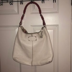 Used Kate Spade with red handle.